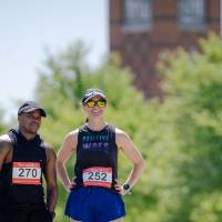 Two racers relax after finishing the race.